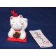 Figurka-dzwonek maneki neko z wróżbą omikuji