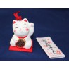 Figurka-dzwonek maneki neko z wróżbą omikuji