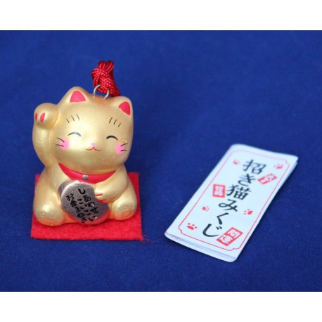 Figurka-dzwonek maneki neko z wróżbą omikuji złoty